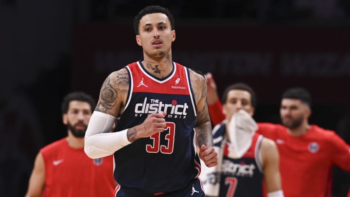 Mar 23, 2024; Washington, District of Columbia, USA;  Washington Wizards forward Kyle Kuzma (33) reacts after scoring a basket during the second half against the Toronto Raptors at Capital One Arena. Mandatory Credit: Tommy Gilligan-USA TODAY Sports
