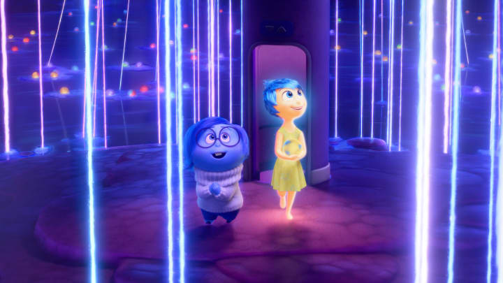 BELIEF SYSTEM – In Disney and Pixar’s “Inside Out 2,” Riley’s Sense of Self is made up of all of her beliefs, each of which can be heard with the pluck of a string. Sadness (voice of Phyllis Smith) and Joy (voice of Amy Poehler) deliver key memories to this formative land. “Inside Out 2” releases only in theaters June 14, 2024. © 2024 Disney/Pixar. All Rights Reserved.