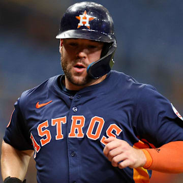 Aug 12, 2024; St. Petersburg, Florida, USA; Houston Astros outfielder Chas McCormick (20) scores a run against the Tampa Bay Rays in the third inning at Tropicana Field