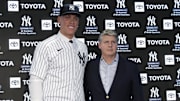 Dec 21, 2022; Bronx, New York, USA; Aaron Judge poses with Hal Steinbrenner during a press conference after being named captain at Yankee Stadium. Mandatory Credit: Jessica Alcheh-Imagn Images