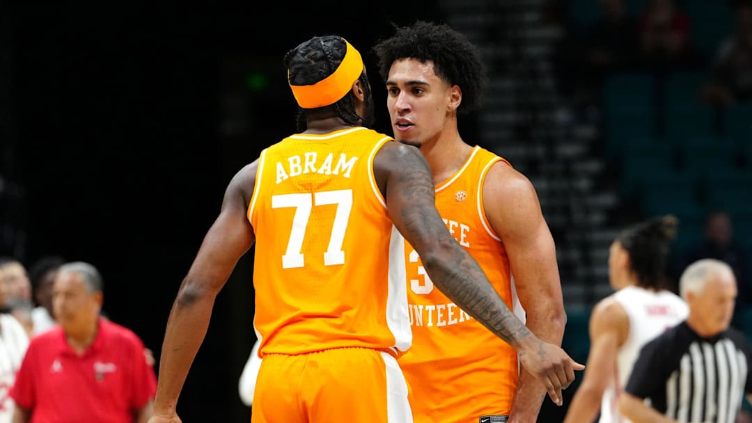Nov 25, 2025; Las Vegas, NV, USA; Tennessee Volunteers guard Amaree Abram (77) and guard Bishop Boswell (3) react in a 2025 Players Era Festival group play game against the Houston Cougars during the first half at MGM Grand Garden Arena. Mandatory Credit: Stephen R. Sylvanie-Imagn Images