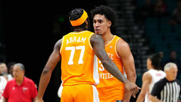 Nov 25, 2025; Las Vegas, NV, USA; Tennessee Volunteers guard Amaree Abram (77) and guard Bishop Boswell (3) react in a 2025 Players Era Festival group play game against the Houston Cougars during the first half at MGM Grand Garden Arena. Mandatory Credit: Stephen R. Sylvanie-Imagn Images