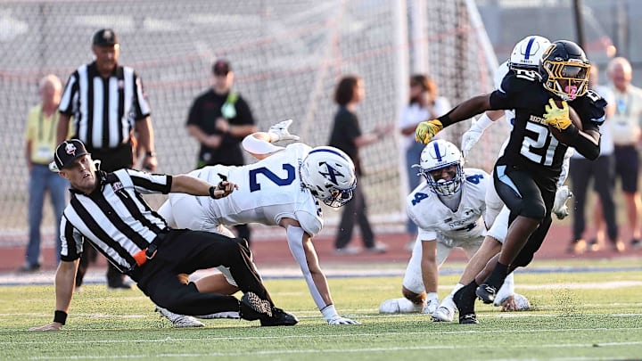 Moeller running back carries the ball during their football game against St. Xavier Friday, Sept. 19, 2025. Moeller running back carries the ball during their football game against St. Xavier Friday, Sept. 19, 2025.