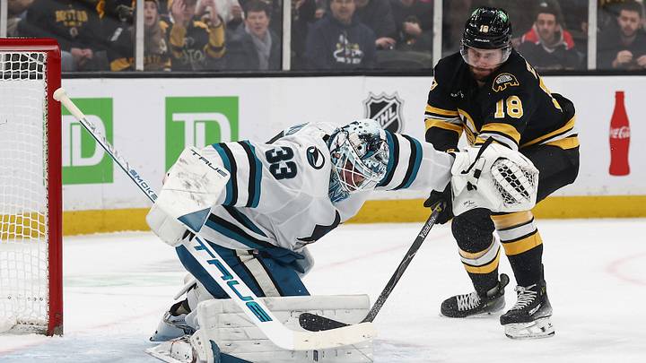 Mar 12, 2026; Boston, Massachusetts, USA; Boston Bruins center Pavel Zacha (18) tries to get to a rebound in front of San Jose Sharks goaltender Alex Nedeljkovic (33) during the second period at TD Garden. Mandatory Credit: Winslow Townson-Imagn Images Mar 12, 2026; Boston, Massachusetts, USA; Boston Bruins center Pavel Zacha (18) tries to get to a rebound in front of San Jose Sharks goaltender Alex Nedeljkovic (33) during the second period at TD Garden. Mandatory Credit: Winslow Townson-Imagn Images