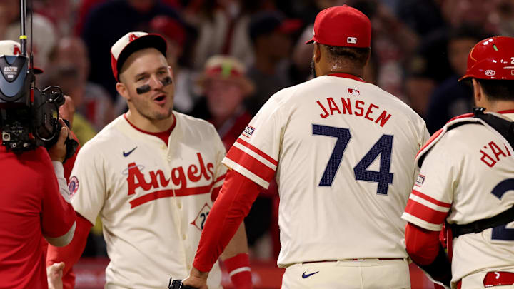 Jun 6, 2025; Anaheim, California, USA; Los Angeles Angels outfielder Mike Trout (27) and pitcher Kenley Jansen (74) celebrate after a win against the Seattle Mariners at Angel Stadium. Mandatory Credit: Jason Parkhurst-Imagn Images Jun 6, 2025; Anaheim, California, USA; Los Angeles Angels outfielder Mike Trout (27) and pitcher Kenley Jansen (74) celebrate after a win against the Seattle Mariners at Angel Stadium. Mandatory Credit: Jason Parkhurst-Imagn Images