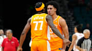 Nov 25, 2025; Las Vegas, NV, USA; Tennessee Volunteers guard Amaree Abram (77) and guard Bishop Boswell (3) react in a 2025 Players Era Festival group play game against the Houston Cougars during the first half at MGM Grand Garden Arena. Mandatory Credit: Stephen R. Sylvanie-Imagn Images