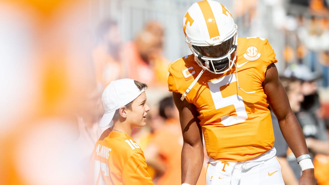 Tennessee quarterback Hendon Hooker (5) shakes hands with Peyton Manning's son Marshall Manning before Tennessee's game against Alabama in Neyland Stadium in Knoxville, Tenn., on Saturday, Oct. 15, 2022.

Kns Ut Bama Football Vol Walk Bp