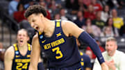Mar 16, 2023; Birmingham, AL, USA; West Virginia Mountaineers forward Tre Mitchell (3) reacts after scoring a basket while being fouled against the Maryland Terrapins during the second half in the first round of the 2023 NCAA Tournament at Legacy Arena. Mandatory Credit: Vasha Hunt-Imagn Images