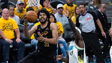 May 9, 2025; Indianapolis, Indiana, USA; Cleveland Cavaliers center Jarrett Allen (31) shoots the ball while  Indiana Pacers forward Pascal Siakam (43) defends during game three of the second round for the 2025 NBA Playoffs at Gainbridge Fieldhouse. Mandatory Credit: Trevor Ruszkowski-Imagn Images