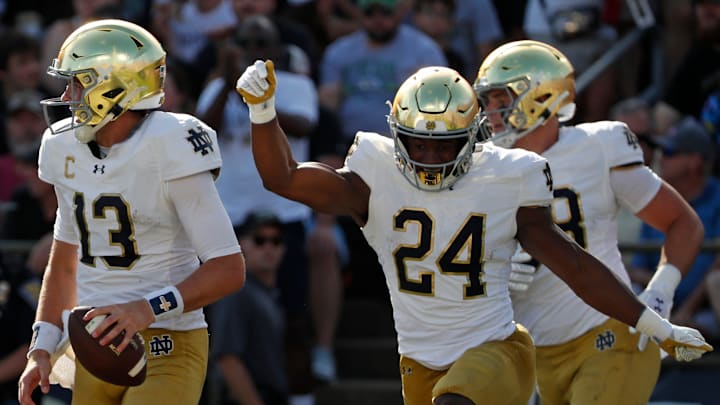 Notre Dame Fighting Irish quarterback Riley Leonard (13) celebrates after scoring a touchdown Saturday, Sept. 14, 2024, during the NCAA football game against the Purdue Boilermakers at Ross-Ade Stadium in West Lafayette, Ind.