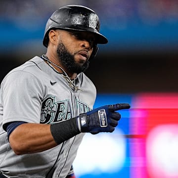 Seattle Mariners designated hitter Carlos Santana runs after hitting a home run against the Toronto Blue Jays in a Wild Card Game on Oct. 8, 2022, at Rogers Centre.