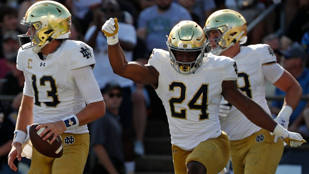 Notre Dame Fighting Irish quarterback Riley Leonard (13) celebrates after scoring a touchdown Saturday, Sept. 14, 2024, during the NCAA football game against the Purdue Boilermakersat Ross-Ade Stadium in West Lafayette, Ind.