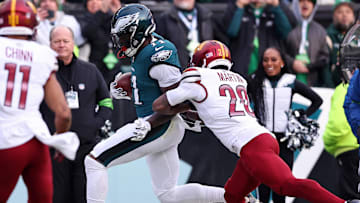 Philadelphia Eagles wide receiver A.J. Brown makes a catch against Washington Commanders safety Quan Martin (20) during the first half in the NFC Championship game at Lincoln Financial Field.