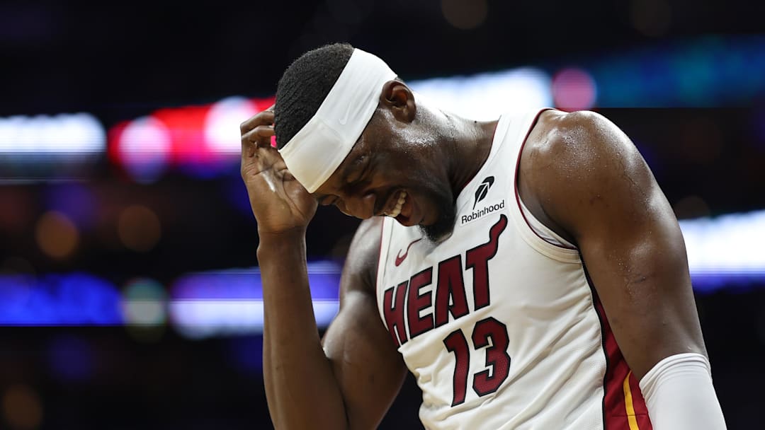 Feb 26, 2026; Philadelphia, Pennsylvania, USA; Miami Heat center Bam Adebayo (13) reacts after a collision during the first quarter against the Philadelphia 76ers at Xfinity Mobile Arena. Mandatory Credit: Bill Streicher-Imagn Images