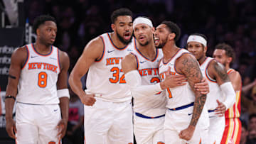 Jan 20, 2025; New York, New York, USA; New York Knicks guard Cameron Payne (1) reacts with teammates after makes a three point basket during the second half against the Atlanta Hawks at Madison Square Garden. Mandatory Credit: Vincent Carchietta-Imagn Images