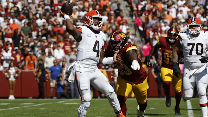 Oct 6, 2024; Landover, Maryland, USA; Cleveland Browns quarterback Deshaun Watson (4) passes the ball under pressure form Washington Commanders defensive tackle Jonathan Allen (93) Oct 6, 2024; Landover, Maryland, USA; Cleveland Browns quarterback Deshaun Watson (4) passes the ball under pressure form Washington Commanders defensive tackle Jonathan Allen (93)