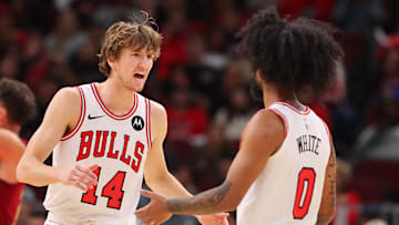 Matas Buzelis, Coby White during a Chicago Bulls game against the Cleveland Cavaliers.