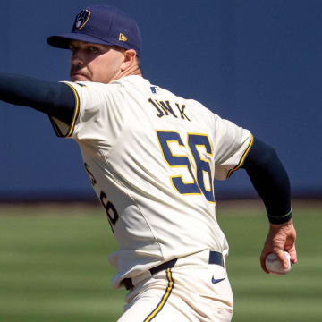 Mar 2, 2024; Phoenix, Arizona, USA; Milwaukee Brewers starting pitcher Janson Junk (56) warms up in the first during a spring training game against the Los Angeles Dodgers at American Family Fields of Phoenix