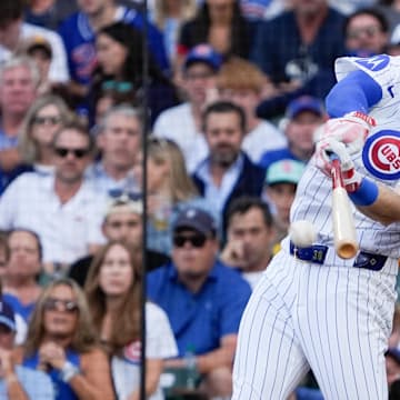Oct 2, 2025; Chicago, Illinois, USA; Chicago Cubs designated hitter Kyle Tucker (30) singles during the second inning against the San Diego Padres during game three of the Wildcard round for the 2025 MLB playoffs at Wrigley Field. Mandatory Credit: David Banks-Imagn Images