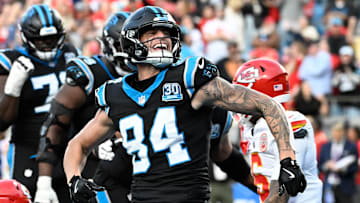 Carolina Panthers tight end Feleipe Franks (84) celebrate after scoring on a two point conversion to tie the score late in the fourth quarter at Bank of America Stadium.