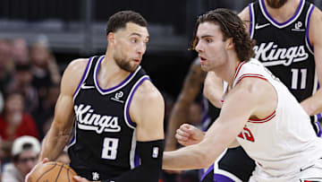 Oct 29, 2025; Chicago, Illinois, USA; Chicago Bulls guard Josh Giddey (3) defends against Sacramento Kings guard Zach LaVine (8) during the first half at United Center. Mandatory Credit: Kamil Krzaczynski-Imagn Images