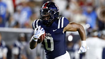 Aug 31, 2024; Oxford, Mississippi, USA; Mississippi Rebels running back Matt Jones (0) runs the ball for a touchdown during the second half against the Furman Paladins at Vaught-Hemingway Stadium.