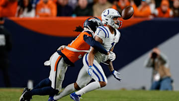 Dec 15, 2024; Denver, Colorado, USA; Indianapolis Colts wide receiver Josh Downs (1) is unable to pull in a pass against Denver Broncos cornerback Kris Abrams-Draine (31) in the fourth quarter at Empower Field at Mile High. 