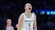 Aug 20, 2025; Los Angeles, California, USA; Dallas Wings guard Paige Bueckers (5) celebrates in the second half against the LA Sparks at Crypto.com Arena. Mandatory Credit: Kirby Lee-Imagn Images