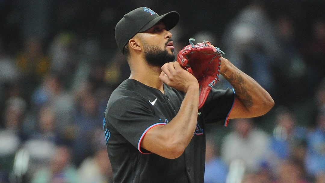 Sep 30, 2022; Milwaukee, Wisconsin, USA;  Miami Marlins starting pitcher Sandy Alcantara (22) looks at the sign before delivering a pitch against the Milwaukee Brewers in the fifth inning at American Family Field. Mandatory Credit: Michael McLoone-Imagn Images