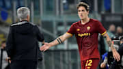 Jose Mourinho coach of AS Roma greets Nicolo Zaniolo of AS...