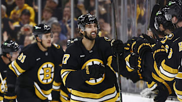 Oct 11, 2025; Boston, Massachusetts, USA; Boston Bruins center Mark Kastelic (47) is congratulated at the bench after scoring against the Buffalo Sabres during the second period at TD Garden. Mandatory Credit: Winslow Townson-Imagn Images