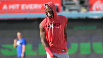 Sep 30, 2025; Los Angeles, California, USA; Cincinnati Reds shortstop Elly De La Cruz (44) warms up before the game against the Los Angeles Dodgers in game one of the Wildcard round for the 2025 MLB playoffs at Dodger Stadium. Mandatory Credit: Jayne Kamin-Oncea-Imagn Images