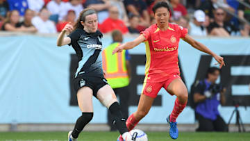 Gotham FC forward Rose Lavalle (16) passes the ball as Portland Thorns FC midfielder Hina Sugita (8) defends during the second half at Red Bull Arena 