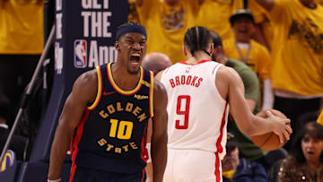 Apr 28, 2025; San Francisco, California, USA; Golden State Warriors forward Jimmy Butler III (10) reacts after scoring against Houston Rockets forward/guard Dillon Brooks (9) during the fourth quarter of game four of the 2025 NBA Playoffs first round at Chase Center. Mandatory Credit: Kelley L Cox-Imagn Images