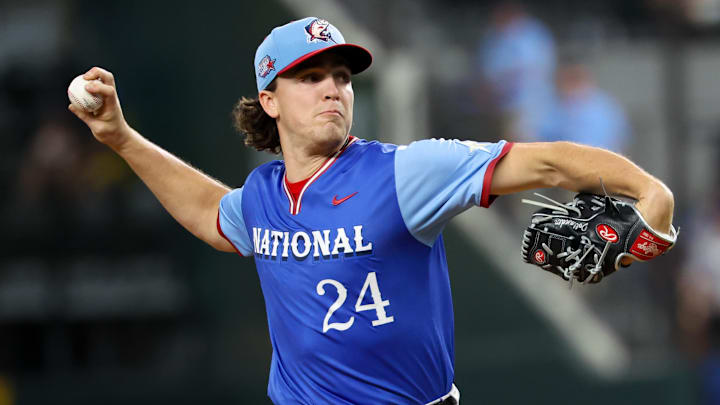 Chase Dollander, top prospect of the Colorado Rockies, pitches during MLB's All-Star Futures Game. Chase Dollander, top prospect of the Colorado Rockies, pitches during MLB's All-Star Futures Game.