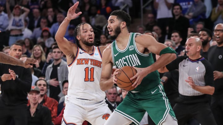 Oct 25, 2023; New York, New York, USA; Boston Celtics forward Jayson Tatum (0) is guarded by New York Knicks guard Jalen Brunson (11) while trying to make a pass in the fourth quarter at Madison Square Garden. Mandatory Credit: Wendell Cruz-USA TODAY Sports