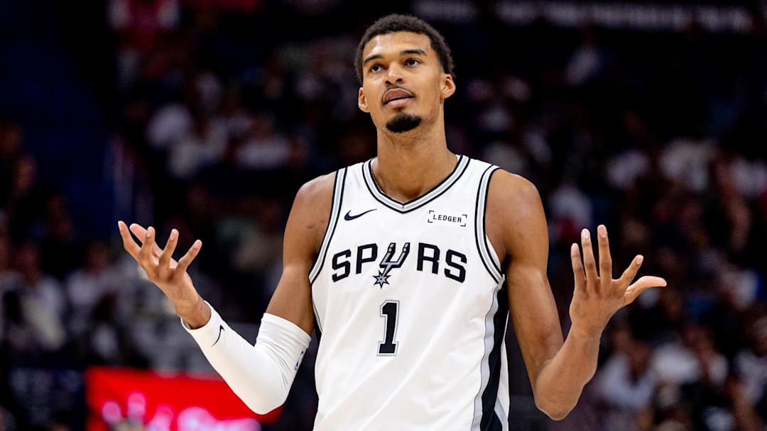 Oct 24, 2025; New Orleans, Louisiana, USA; San Antonio Spurs forward/center Victor Wembanyama (1) reacts to being fouled by New Orleans Pelicans center Derik Queen (not pictured) during the second half at Smoothie King Center. Mandatory Credit: Stephen Lew-Imagn Images Oct 24, 2025; New Orleans, Louisiana, USA; San Antonio Spurs forward/center Victor Wembanyama (1) reacts to being fouled by New Orleans Pelicans center Derik Queen (not pictured) during the second half at Smoothie King Center. Mandatory Credit: Stephen Lew-Imagn Images