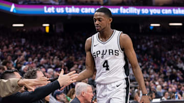 Mar 7, 2025; Sacramento, California, USA; De'Aaron Fox high fives teammates after coming out of the game during the fourth quarter at Golden 1 Center