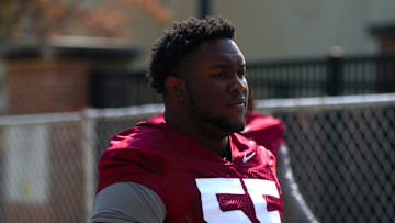FSU football players walk into the first spring practice of the spring season on Wednesday, March 19, 2025