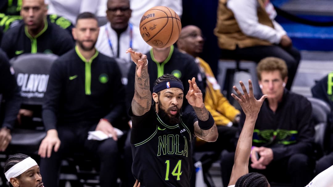 Apr 29, 2024; New Orleans, Louisiana, USA; New Orleans Pelicans forward Brandon Ingram (14) passes the ball against the Oklahoma City Thunder during game four of the first round for the 2024 NBA playoffs at Smoothie King Center.