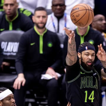 Apr 29, 2024; New Orleans, Louisiana, USA; New Orleans Pelicans forward Brandon Ingram (14) passes the ball against the Oklahoma City Thunder during game four of the first round for the 2024 NBA playoffs at Smoothie King Center.