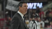 Jan 14, 2023; Raleigh, North Carolina, USA;  Pittsburgh Penguins head coach Mike Sullivan looks up after the game against the Carolina Hurricanes at PNC Arena. Mandatory Credit: James Guillory-Imagn Images