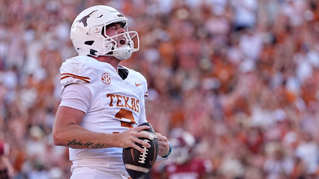 Texas Longhorns quarterback Quinn Ewers (3) celebrates a touchdown in the second half of the Red River Rivalry college football game between the University of Oklahoma Sooners and the Texas Longhorn at the Cotton Bowl Stadium in Dallas, Texas, Saturday, Oct., 12, 2024.