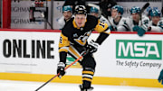 Nov 16, 2024; Pittsburgh, Pennsylvania, USA;  Pittsburgh Penguins right wing Jesse Puljujarvi (18) moves the puck against the San Jose Sharks during the first period at PPG Paints Arena. Mandatory Credit: Charles LeClaire-Imagn Images