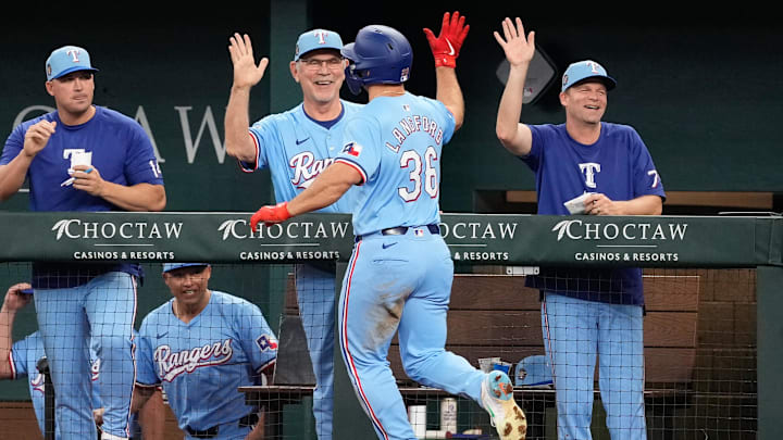 Apr 28, 2024; Arlington, Texas, USA; Texas Rangers designated hitter Wyatt Langford (36) celebrates