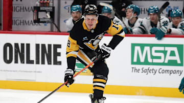 Nov 16, 2024; Pittsburgh, Pennsylvania, USA;  Pittsburgh Penguins right wing Jesse Puljujarvi (18) moves the puck against the San Jose Sharks during the first period at PPG Paints Arena. Mandatory Credit: Charles LeClaire-Imagn Images