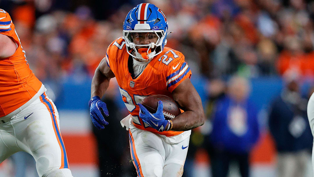 Nov 6, 2025; Denver, Colorado, USA; Denver Broncos running back J.K. Dobbins (27) runs the ball in the fourth quarter against the Las Vegas Raiders at Empower Field at Mile High. 