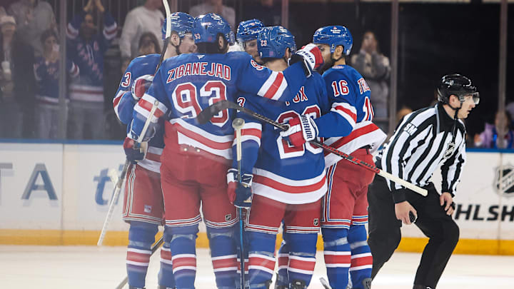 Apr 5, 2026; New York, New York, USA; New York Rangers defenseman Adam Fox (23) celebrates his goal against the Washington Capitals during the second period at Madison Square Garden.