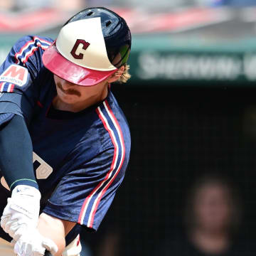 Cleveland Guardians first baseman Kyle Manzardo (9) hits an RBI double during the eighth inning against the New York Mets at Progressive Field on May 22.