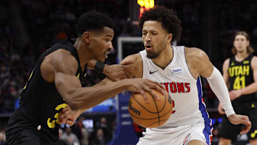 Dec 21, 2023; Detroit, Michigan, USA;  Utah Jazz guard Ochai Agbaji (30) dribbles defended by